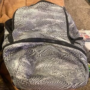 Lululemon backpack with lots of zippers and pockets!